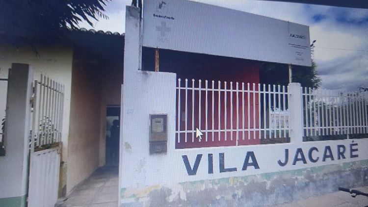Fachada de prédio com nome Vila Jacaré